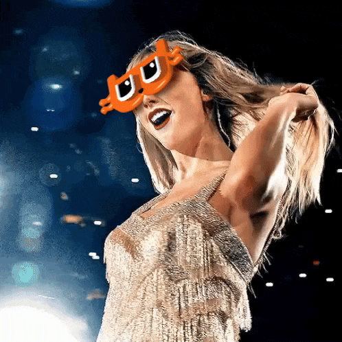 Woman in Gold Dress and Orange Sunglasses with Letter U