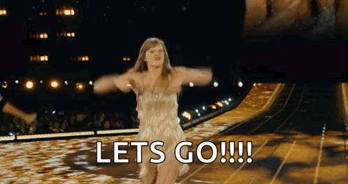 Woman in Gold Dress Dancing Let's Go