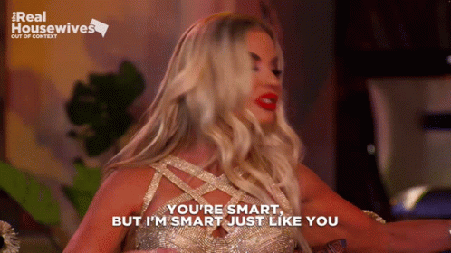 Woman In Gold Dress Saying You're Smart GIF