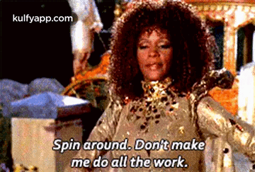 Woman In Gold Dress Says Spin Around Don't Make Me Do All Work GIF