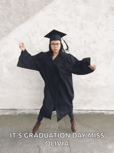 Woman in Graduation Cap and Gown Dancing It's Graduation Day Miss Olivia