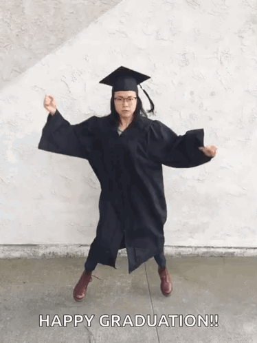 Woman In Graduation Cap And Gown Dancing GIF