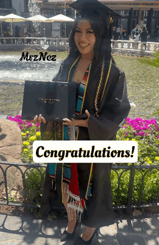 Woman in Graduation Cap and Gown Saying Congratulations