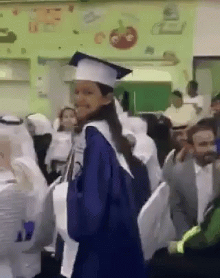 Woman in Graduation Cap and Gown