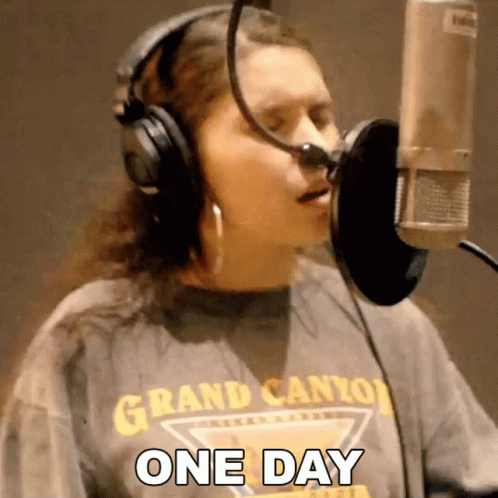 Woman In Grand Canyon Shirt Singing One Day GIF