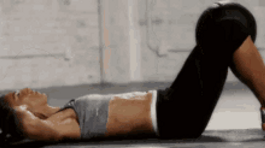 Woman In Gray Doing Abs Crunches Exercise GIF