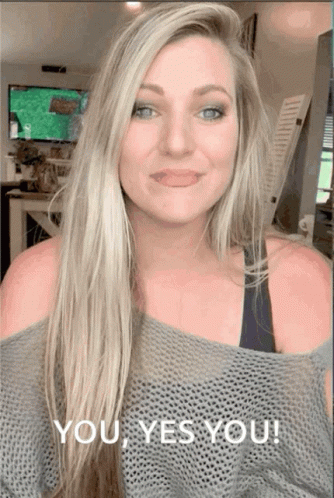 Woman in Gray Sweater Saying You Yes You