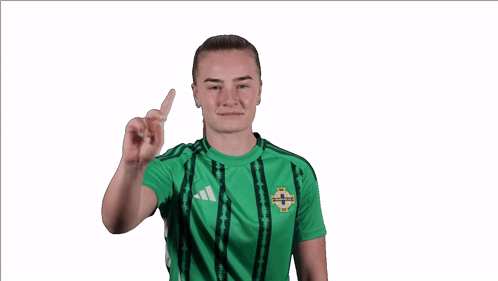 Woman in Green Adidas Shirt Holding Card