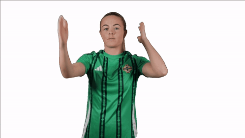 Woman in Green Adidas Shirt Thumbs Up