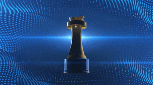 Woman In Green And Brown Striped Shirt Holding Winner Trophy GIF