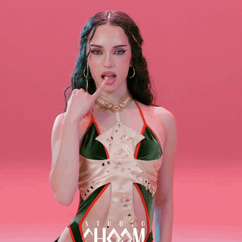 Woman in Green and Gold Dress With Choom