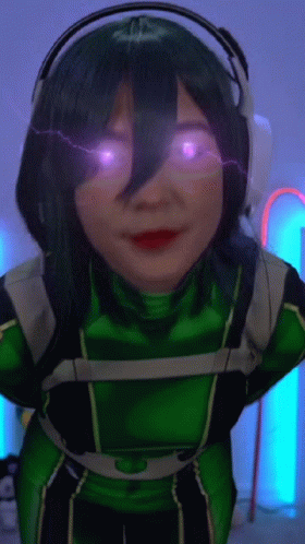 Woman in Green Costume and Headphones with Purple Eyes