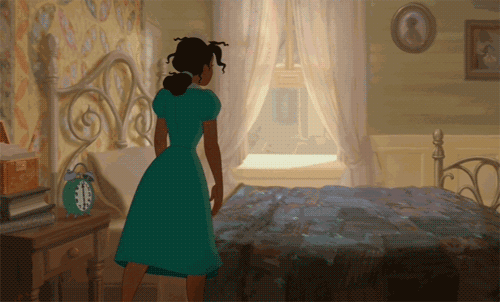 Woman In Green Dress By Bed With Alarm Clock GIF