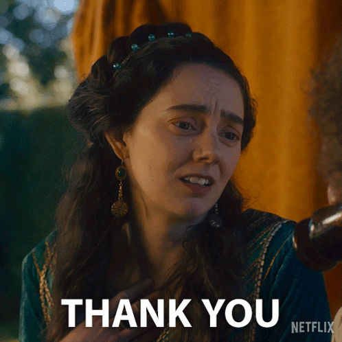 Woman in Green Dress Giving Thanks