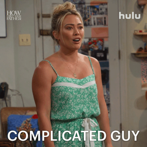Woman In Green Dress Saying Complicated Guy GIF