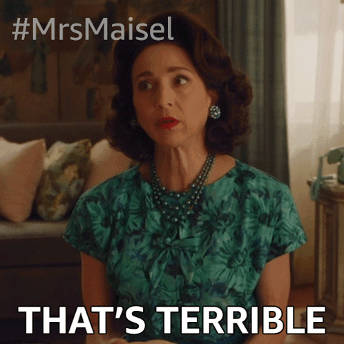 Woman In Green Dress Saying That's Terrible GIF