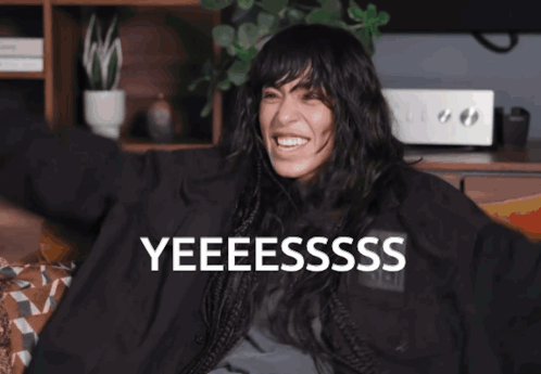 Woman in Green Fur Coat Singing
