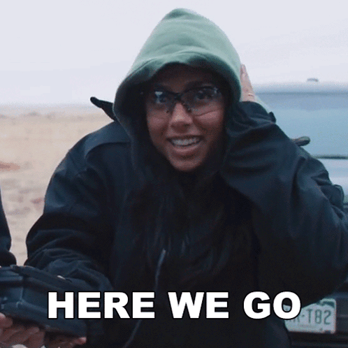 Woman in Green Hoodie Saying Here We Go