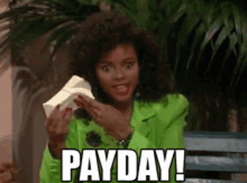 Woman In Green Jacket Holding Paper Saying Payday GIF