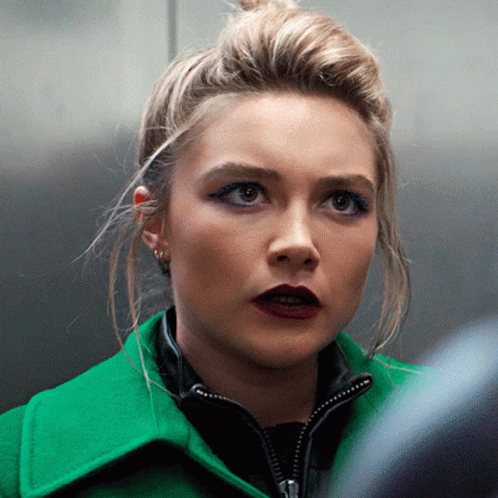 Woman In Green Jacket GIF
