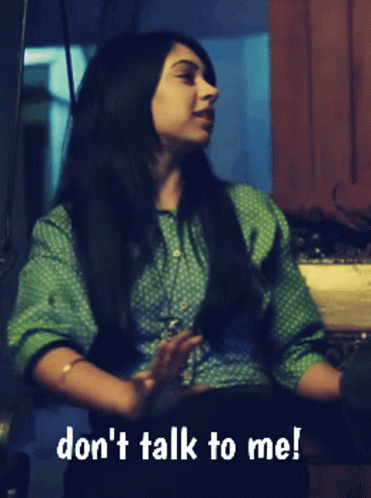 Woman in Green Polka Dot Shirt Says Don't Talk to Me