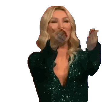 Woman in Green Sequin Dress Holding Microphone