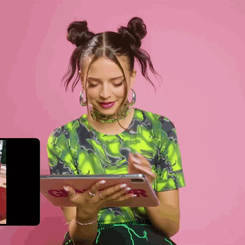 Woman In Green Shirt Holding Tablet Saying Girl GIF