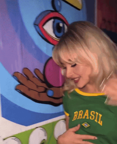 Woman in Green Shirt Saying Brasil
