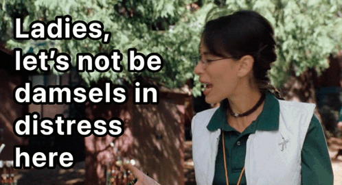 Woman in Green Shirt Saying Ladies Let's Not Be Damsels in Distress