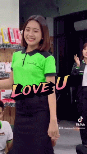 Woman in Green Shirt Saying Love U