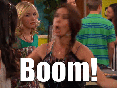 Woman in Green Shirt Says Boom