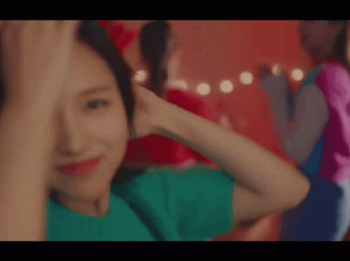 Woman In Green Shirt Smiling GIF
