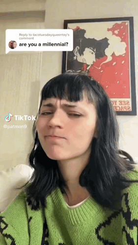 Woman in Green Sweater Making Funny Face