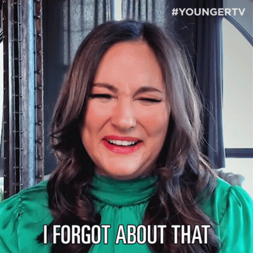 Woman In Green Top Making Funny Face Saying I Forgot About That GIF