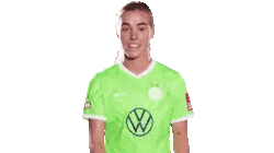 Woman In Green Volkswagen Shirt Giving Thumbs Up