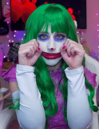 Woman in Green Wig and White Gloves Joker