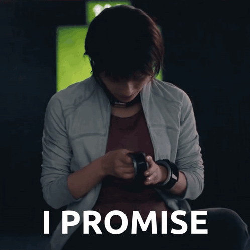 Woman In Grey Jacket Playing Video Game Promising GIF