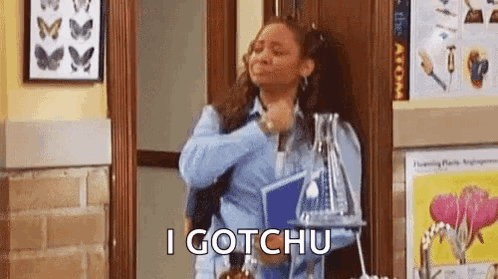 Woman In Hallway With Beaker And Book GIF