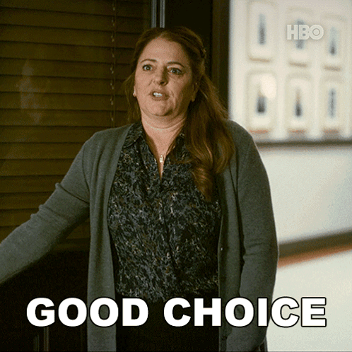Woman in Hallway With Good Choice Sign