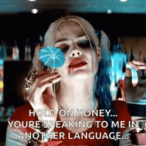 Woman In Harley Quinn Costume Holding Blue Umbrella GIF