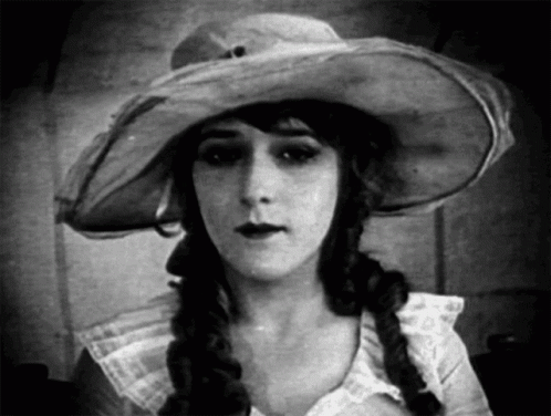 Woman in Hat and Braids Black and White