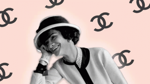 Woman in Hat and Pearl Necklace Surrounded by Chanel Logos