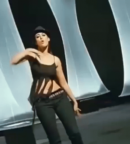 Woman in Hat Dancing on Stage