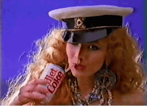 Woman in Hat Drinking Diet Coke