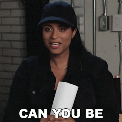 Woman In Hat Holding Paper Says Can You Be GIF