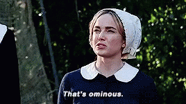 Woman In Hat In Woods Saying That's Ominous GIF