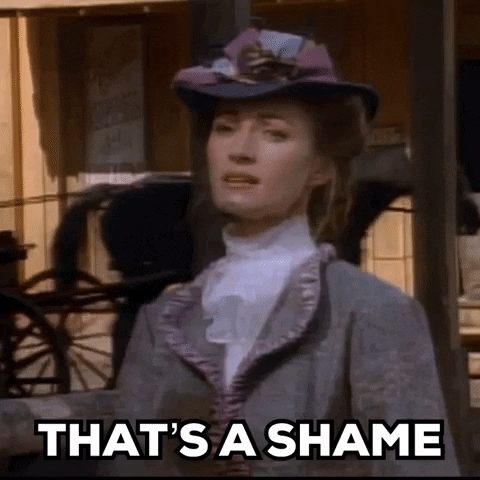 Woman in Hat Saying Shame