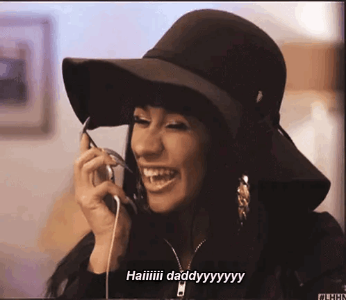 Woman in Hat Talking on Phone