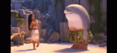 Woman In Hawaiian Outfit Next To Stuffed Dolphin GIF