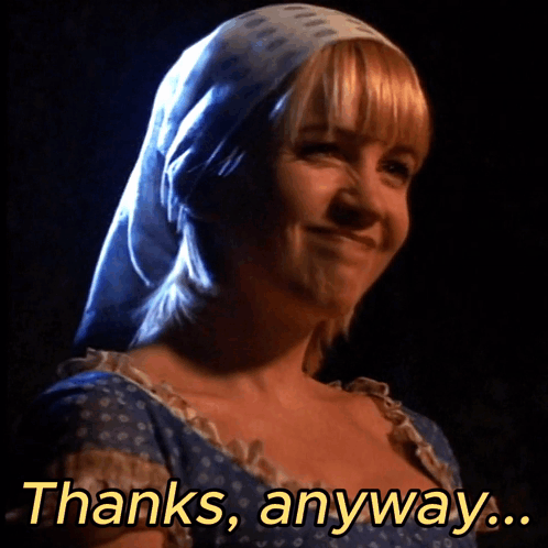 Woman in Head Scarf Smiling Thanks Anyway